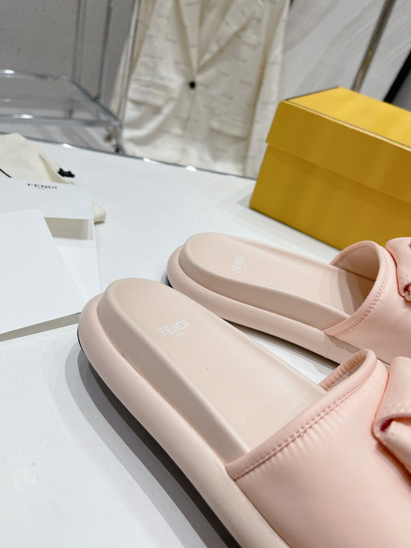 FENDI BAGUETTE SLIPPERS IN PASTEL PINK LAMBSKIN WITH GOLD HARDWARE