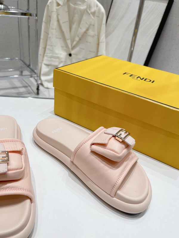 FENDI BAGUETTE SLIPPERS IN PASTEL PINK LAMBSKIN WITH GOLD HARDWARE