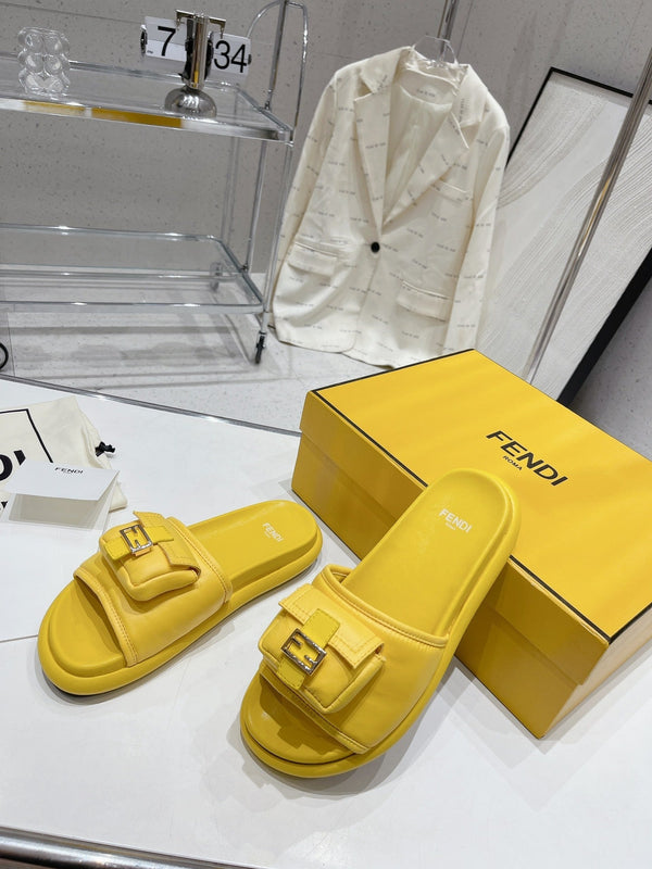 FENDI BAGUETTE SLIPPERS IN NAPLES YELLOW LAMBSKIN WITH GOLD HARDWARE