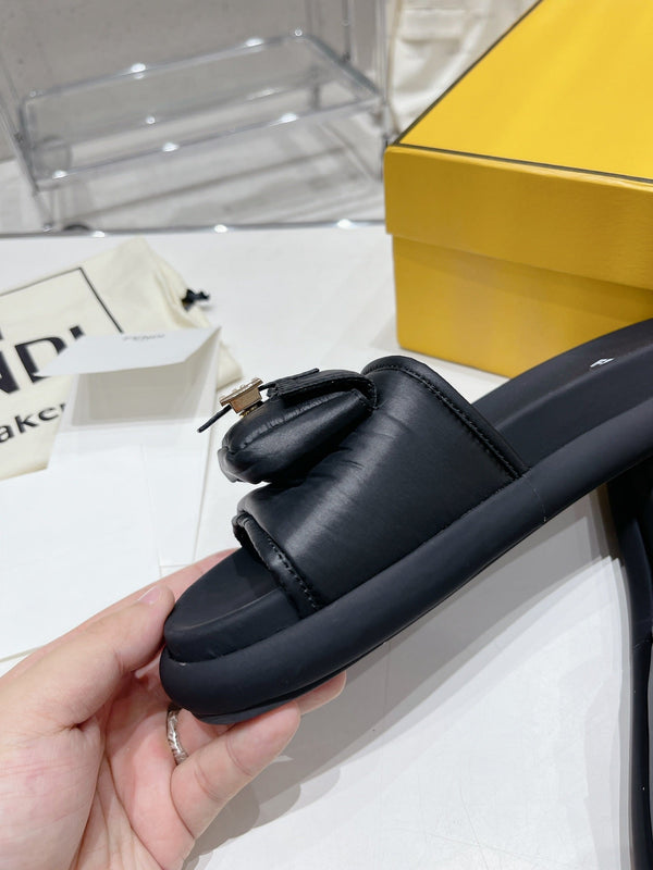 FENDI BAGUETTE SLIPPERS IN BLACK LAMBSKIN WITH GOLD HARDWARE