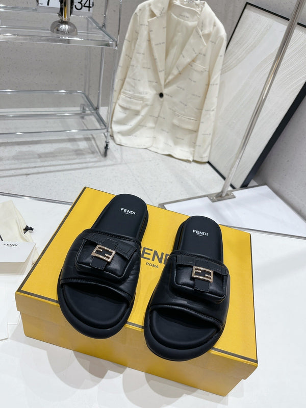 FENDI BAGUETTE SLIPPERS IN BLACK LAMBSKIN WITH GOLD HARDWARE