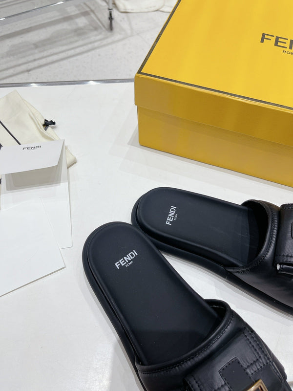 FENDI BAGUETTE SLIPPERS IN BLACK LAMBSKIN WITH GOLD HARDWARE