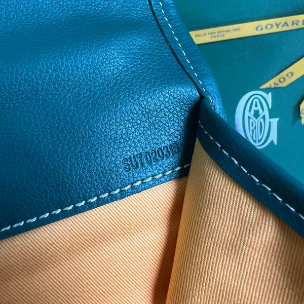 ZAINO SAINT LÉGER 35 IN TELA GOYARDINE VERDE E PELLE DI VITELLO CON PATCH CARTONI ANIMATI