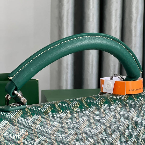 ZAINO SAINT LÉGER 35 IN TELA GOYARDINE VERDE E PELLE DI VITELLO CON PATCH CARTONI ANIMATI