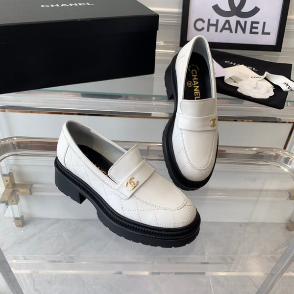 mocassini bianchi neri in pelle di vitello trapuntata