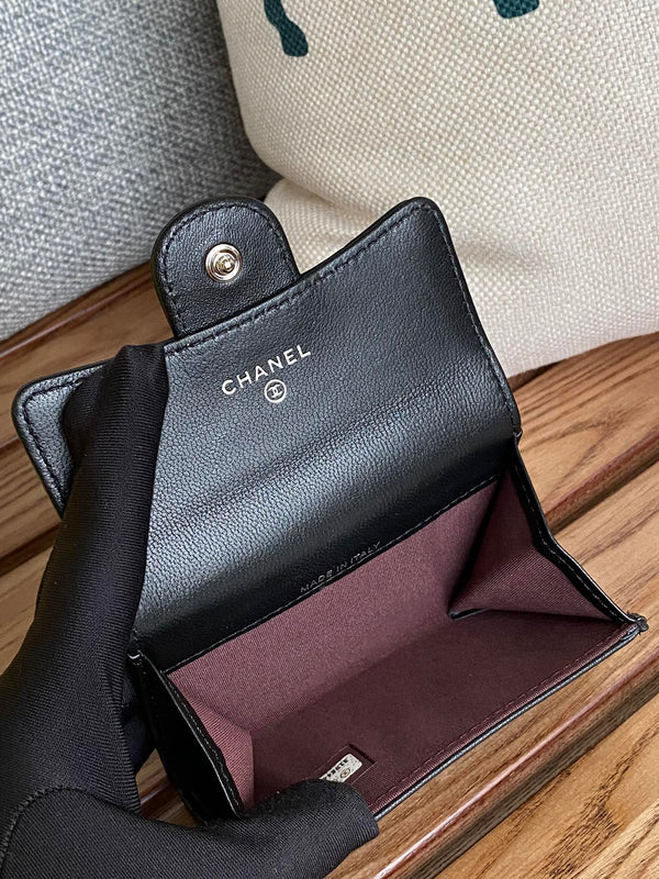 Portafoglio piccolo cc 11cm in pelle di agnello nera con finiture in argento