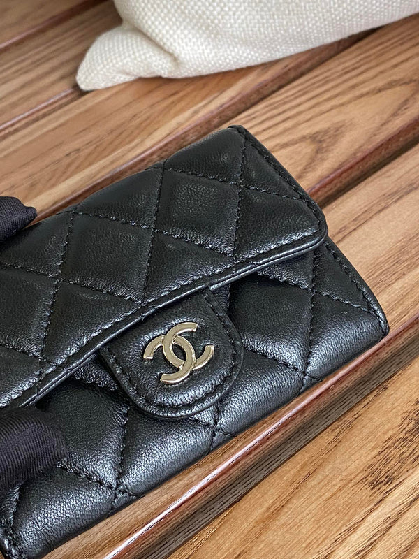 Portafoglio piccolo cc 11cm in pelle di agnello nera con finiture in argento