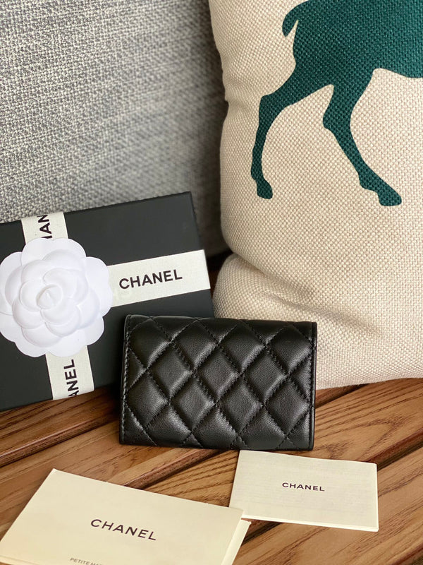 Portafoglio piccolo cc 11 cm in pelle di agnello nera con finiture dorate