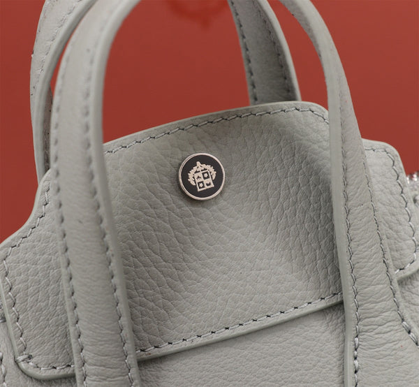 SAC NANO SMILE 18 EN VEAU LISSE GRIS HARBOR