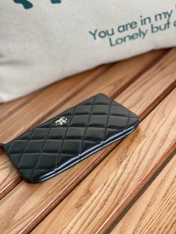 Portafoglio con cerniera cc 15 in pelle di agnello nera con finiture in argento