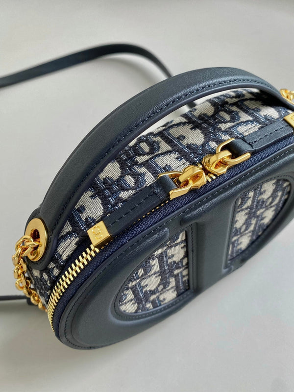 BORSA OVALE SIGNATURE 18 IN JACQUARD OBLIQUO BLU