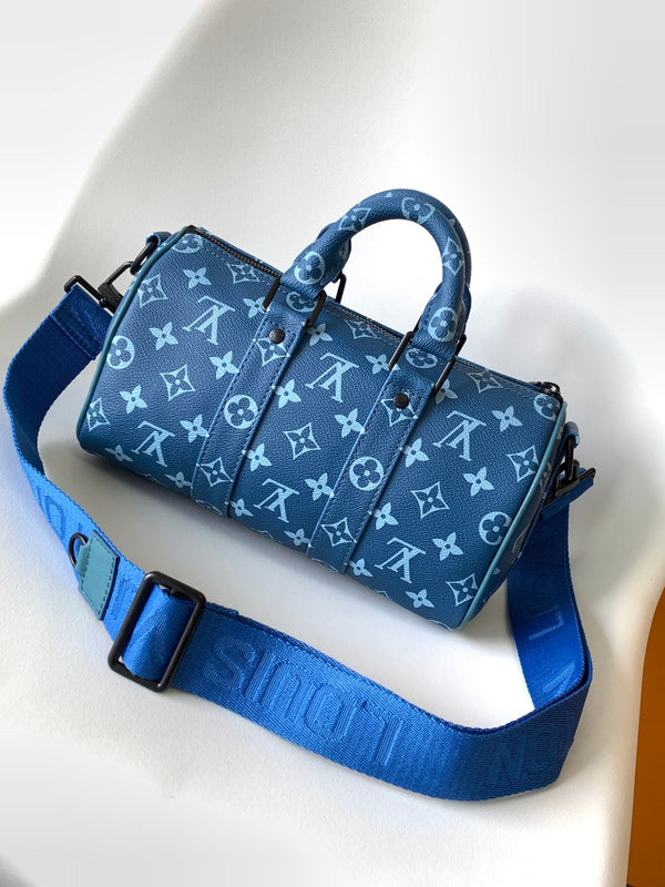 LV 21s Keepall Bandoulière 25 Blue Monogram Canvas & Cowhide