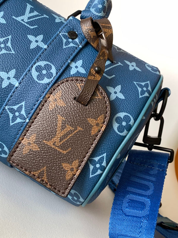 LV 21s Keepall Bandoulière 25 Blue Monogram Canvas & Cowhide