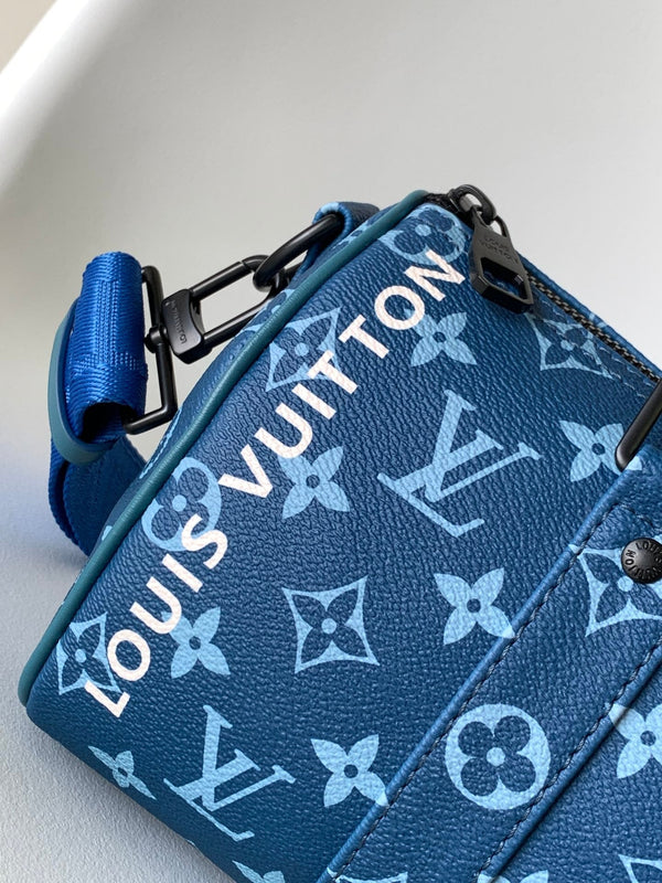 LV 21s Keepall Bandoulière 25 Blue Monogram Canvas & Cowhide