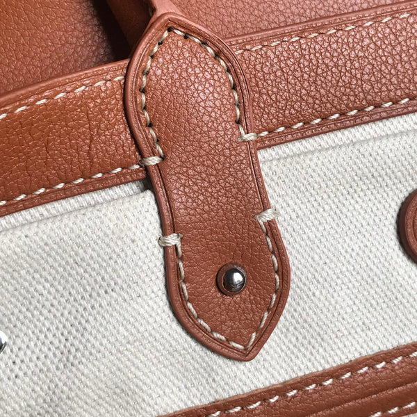 SAIGON SOUPLE BAG 34 IN BROWN GOYARDINE CANVAS AND CALFSKIN