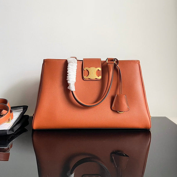 BORSA A MANO TRIOMPHE 37 IN PELLE DI VITELLO MARRONE SOFT TAN