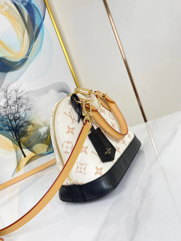 ALMA BB 25 IN WHITE MONOGRAM DUNE CANVAS GOLD HARDWARE