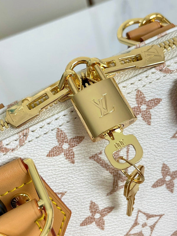 ALMA BB 25 IN WHITE MONOGRAM DUNE CANVAS GOLD HARDWARE