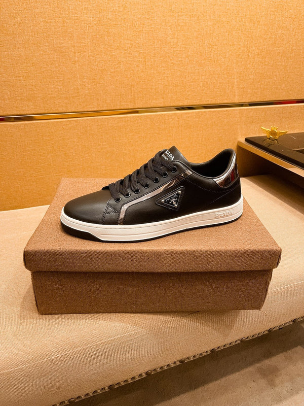 PRA SNEAKER IN BLACK CALFSKIN WITH GLOSSY GOLDEN