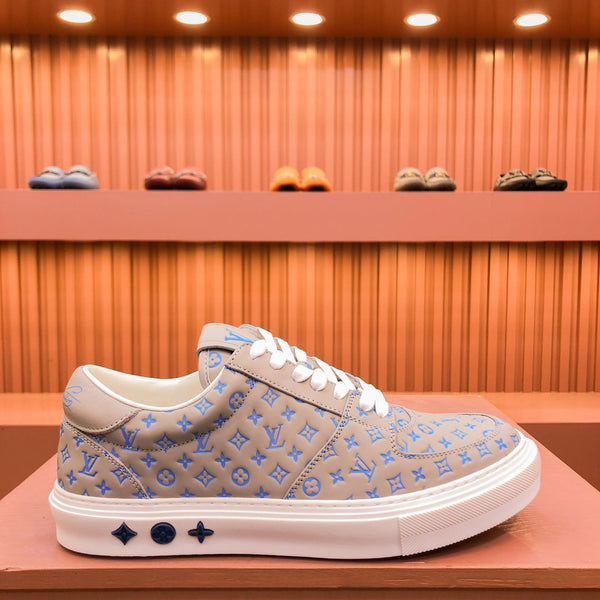 SNEAKER LV TRAINER IN PELLE DI VITELLO MONOGRAMMA BEIGE CAMMELLO