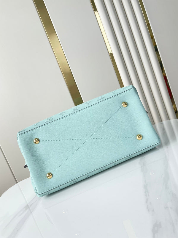 CARMEL 40 IN SKY BLUE MONOGRAM PERFORATED CALFSKIN