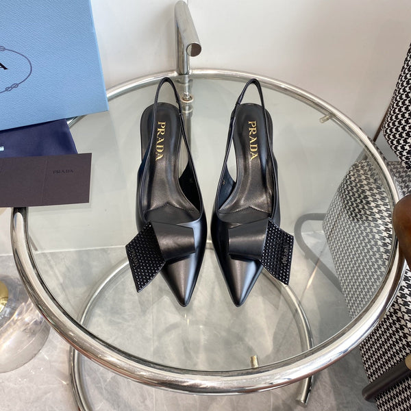 DÉCOLLETÉ SLINGBACK PRA IN PELLE DI AGNELLO CON FIOCCO NERO
