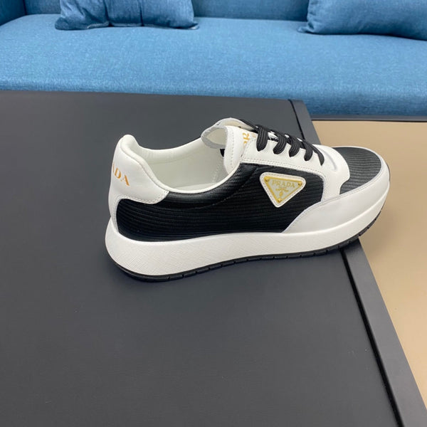 PRA SNEAKER IN WHITE CALFSKIN AND BLACK FABRIC WITH GOLDEN LOGO