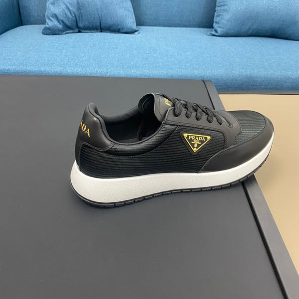 PRA SNEAKER IN BLACK CALFSKIN AND FABRIC WITH GOLDEN LOGO
