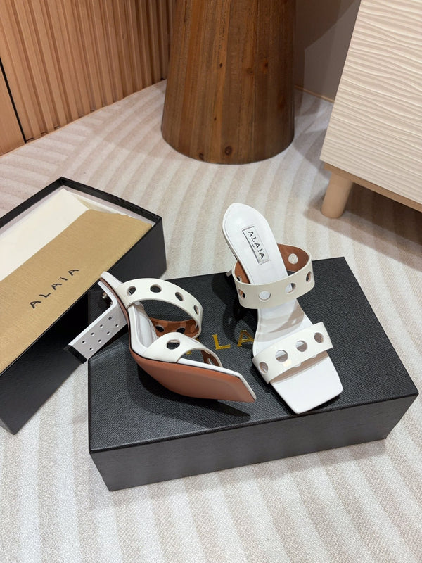 ALAIA TWO-STRAPS HIGH HEEL SANDALS IN WHITE PATENT LAMBSKIN