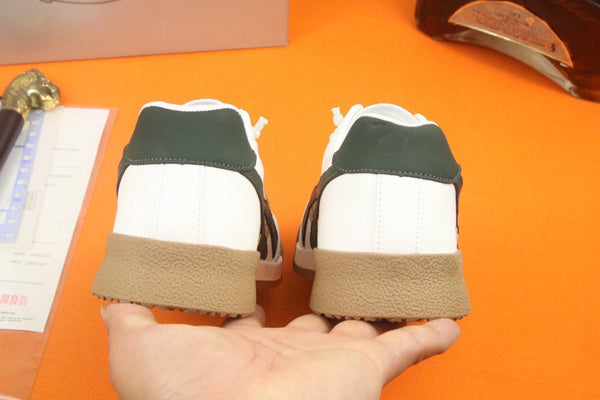 PRA SNEAKER IN WHITE CALFSKIN WITH BLACK AND YELLOW STRIPED