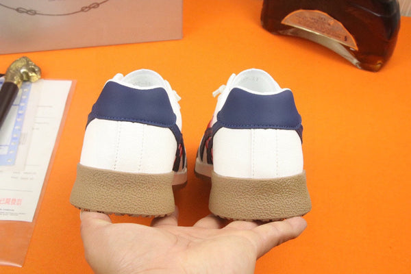 PRA SNEAKER IN WHITE CALFSKIN WITH NAVY BLUE AND RED STRIPED