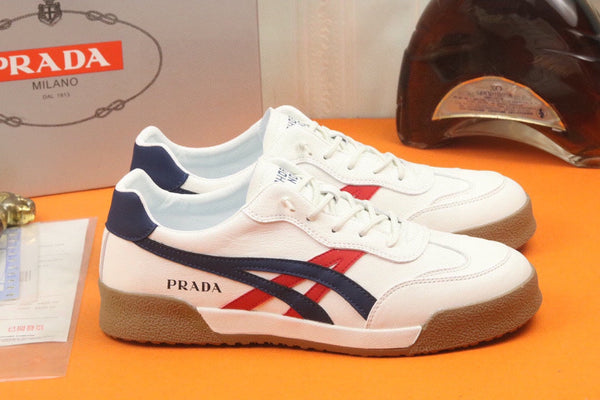 PRA SNEAKER IN WHITE CALFSKIN WITH NAVY BLUE AND RED STRIPED