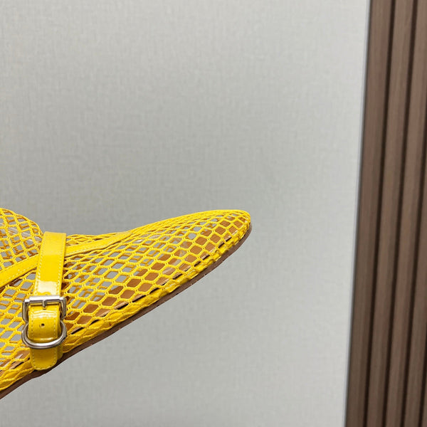 ALAIA SHORT BOOTS IN LEMON YELLOW MESH FISHNET