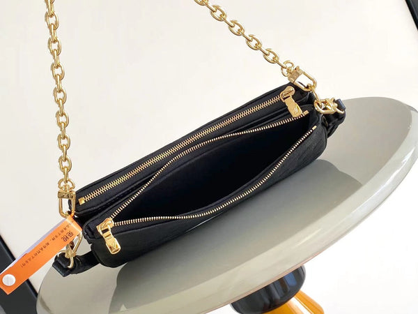 POCHETTE LIV 24 IN PELLE EMPREINTE MONOGRAM NERA HARDWARE ORO