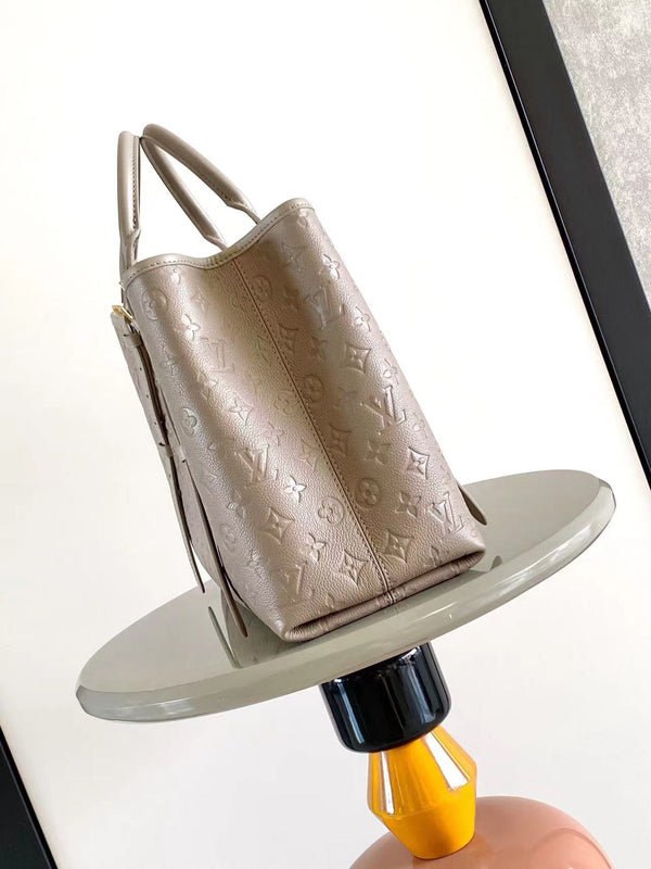 TOTE BABYLONE MM 39 IN PELLE EMPREINTE MONOGRAM TOURTERELLE