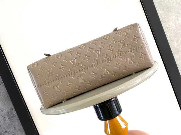 TOTE BABYLONE MM 39 IN PELLE EMPREINTE MONOGRAM TOURTERELLE