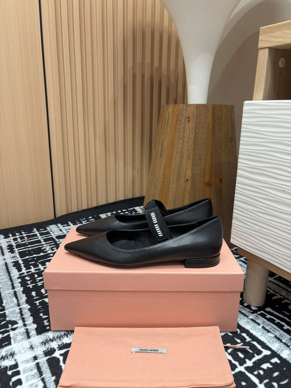 Ballerines Miu en peau de mouton noire