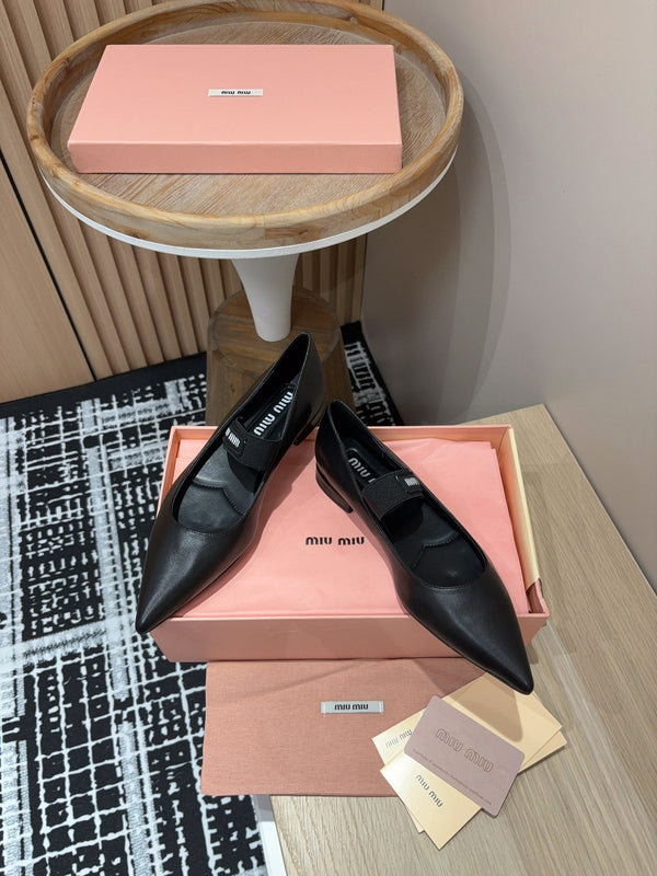 Ballerines Miu en peau de mouton noire