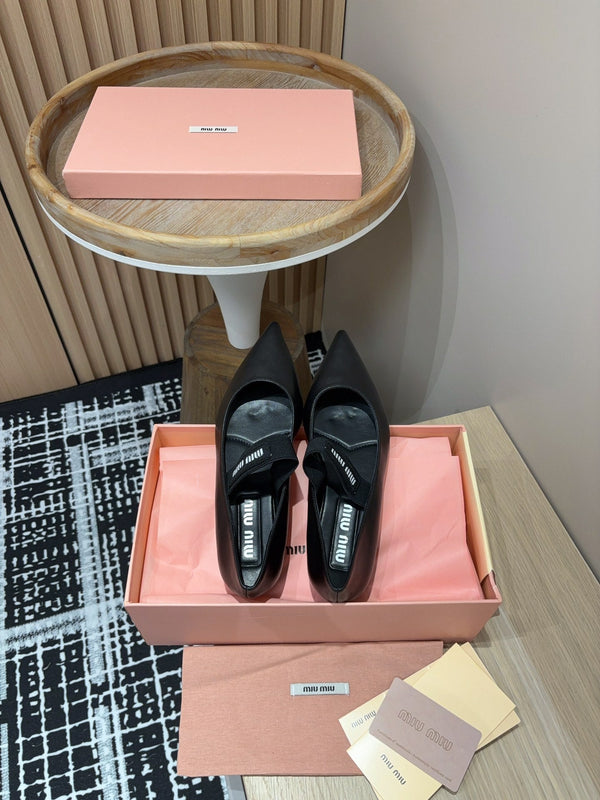 Ballerines Miu en peau de mouton noire
