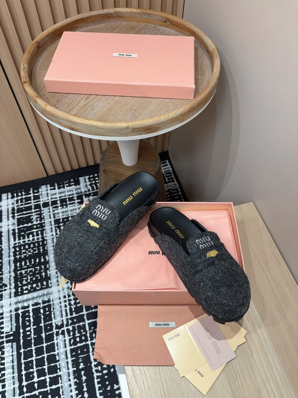 Miu slippers Black Original Wool