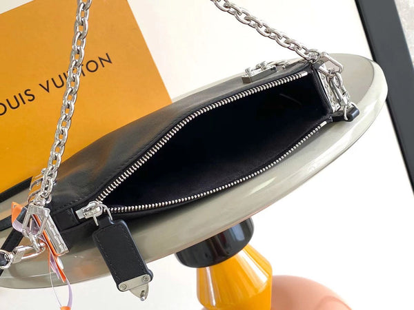 SLIM TRUNK 23 IN PELLE DI VITELLO NERA CON FERRAMENTA IN ARGENTO