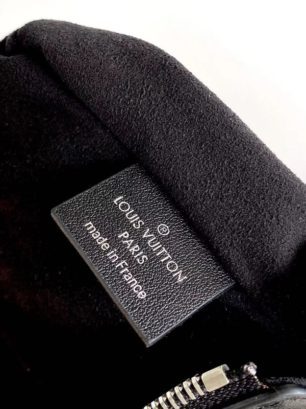 SLIM TRUNK 23 IN PELLE DI VITELLO NERA CON FERRAMENTA IN ARGENTO