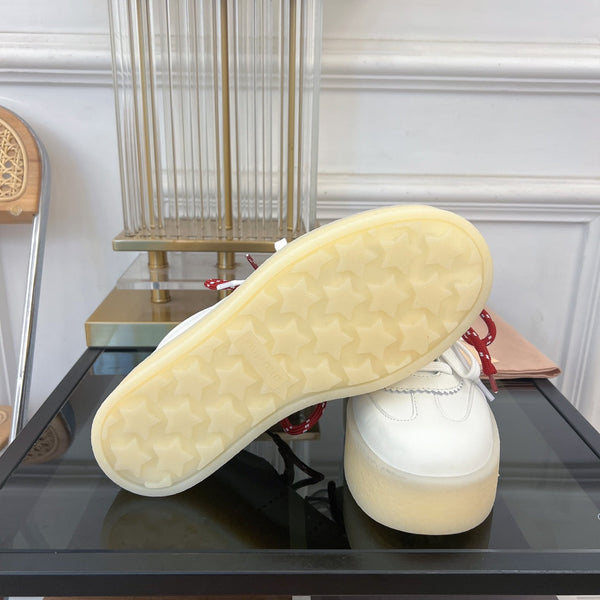 Sneakers Miu bianche in misto pelle di vacchetta con stringhe rosse