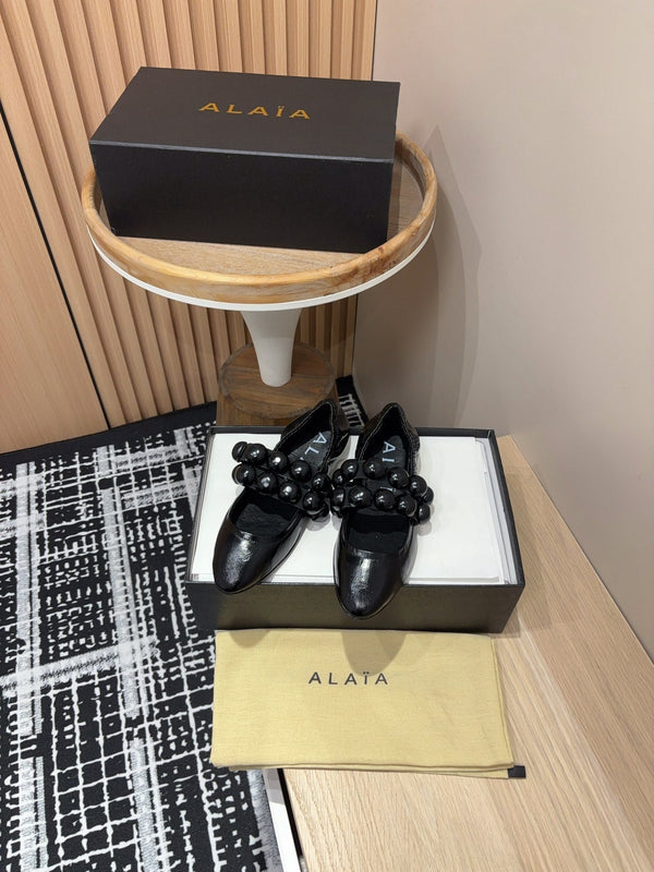 Alaila Sphere Ballet Flats In Black Glossy Calfskin 964200