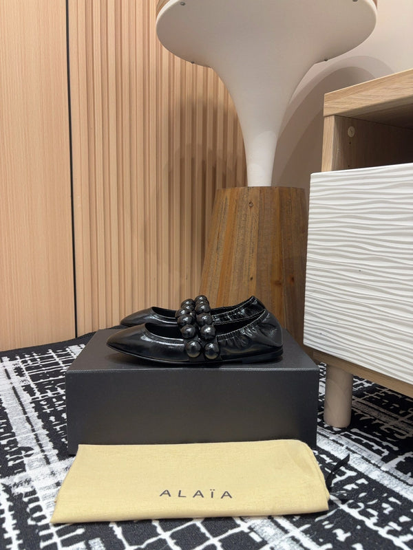 Alaila Sphere Ballet Flats In Black Glossy Calfskin 964200