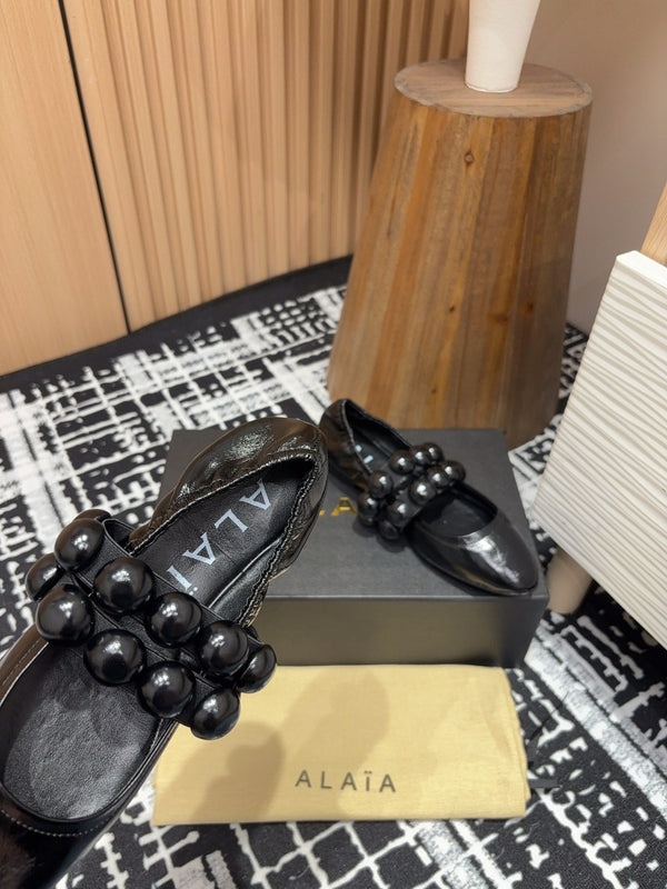 Alaila Sphere Ballet Flats In Black Glossy Calfskin 964200