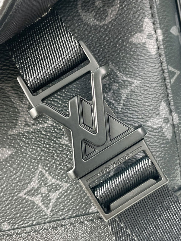 MESSENGER VOYAGER PM 33 IN GUN METAL MONOGRAM ECLIPSE CANVAS