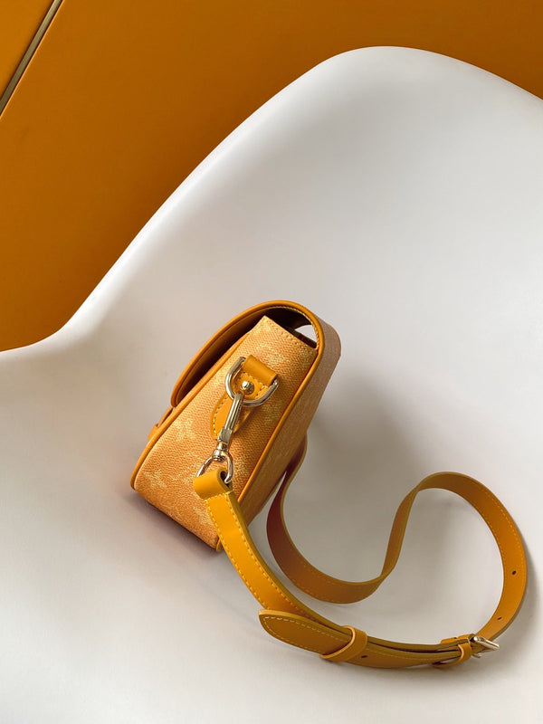 LV Montsouris Messenger 20cm Yellow Monogram Heritage Canvas & Cowhide GHW