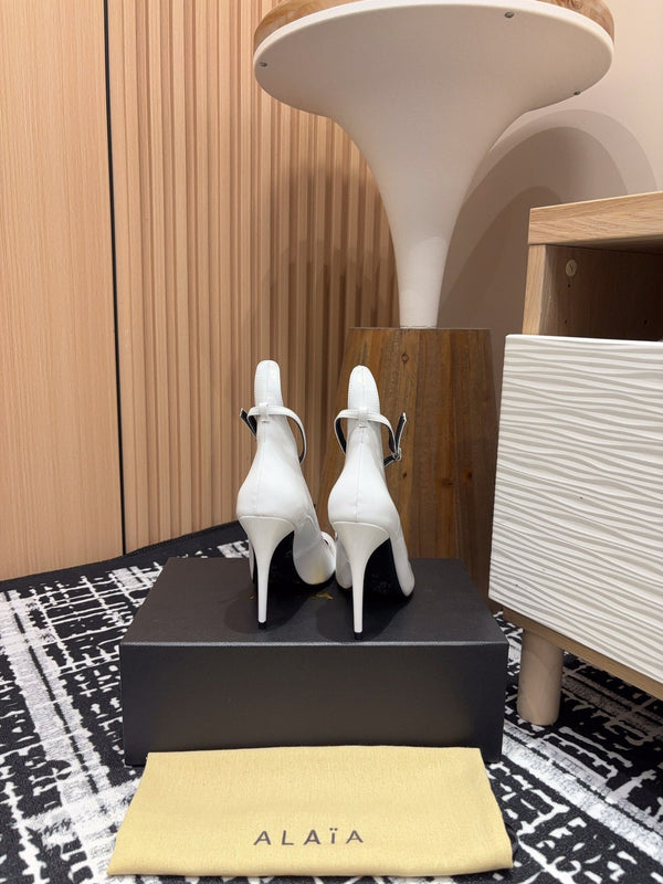 Alaia Decollete Pumps 105mm In White Glossy Cowhide 121910