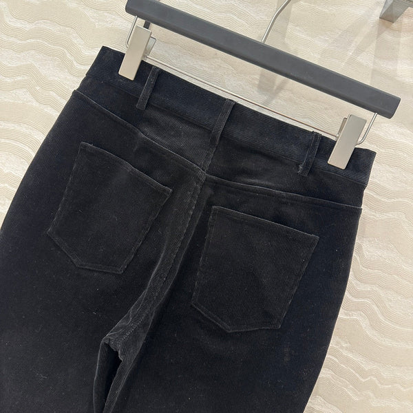 Pantaloni svasati in velluto Celine in cotone nero